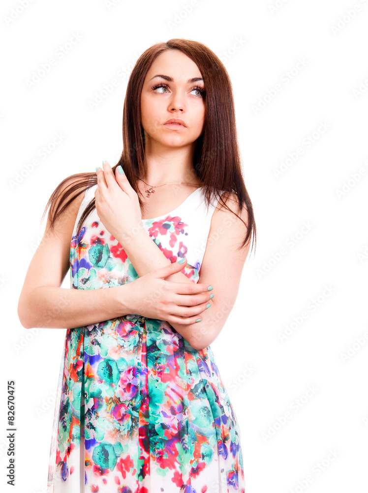 Beautiful young woman in a bright many-coloured dress Beautiful young woman in a bright many-coloured dress