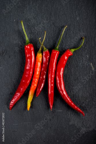 Burning hot vibrant red mexican chilli peppers