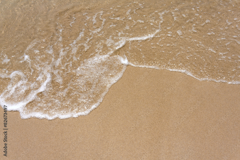 Water and sand background on the beach Water and sand background on the beach