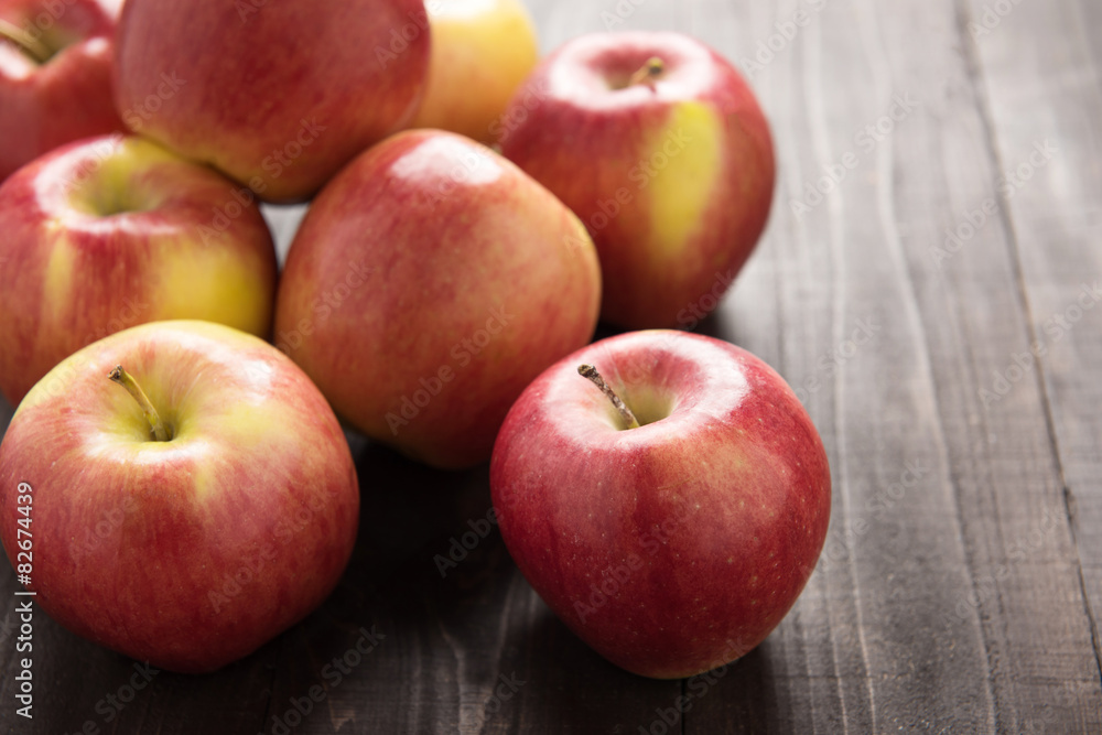 Fresh ripe red apples on wooden background Fresh ripe red apples on wooden background