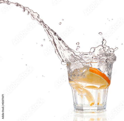 cocktail in a martini glass on a white background with fruit