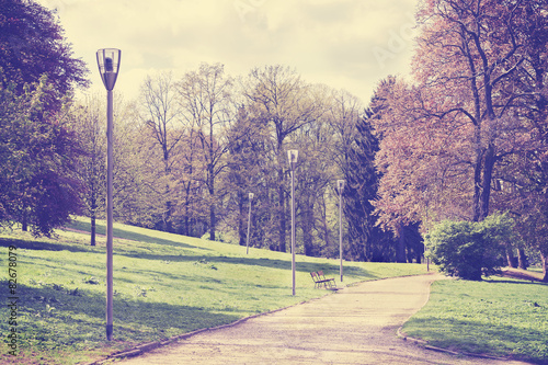 Vintage filtered path in a Park Kasprowicza in Szczecin, Poland. photo