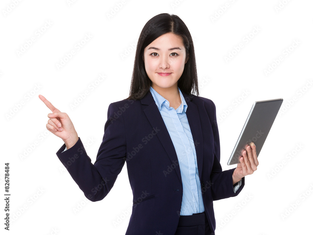 Asian businesswoman use of tablet and finger pointing up Asian businesswoman use of tablet and finger pointing up