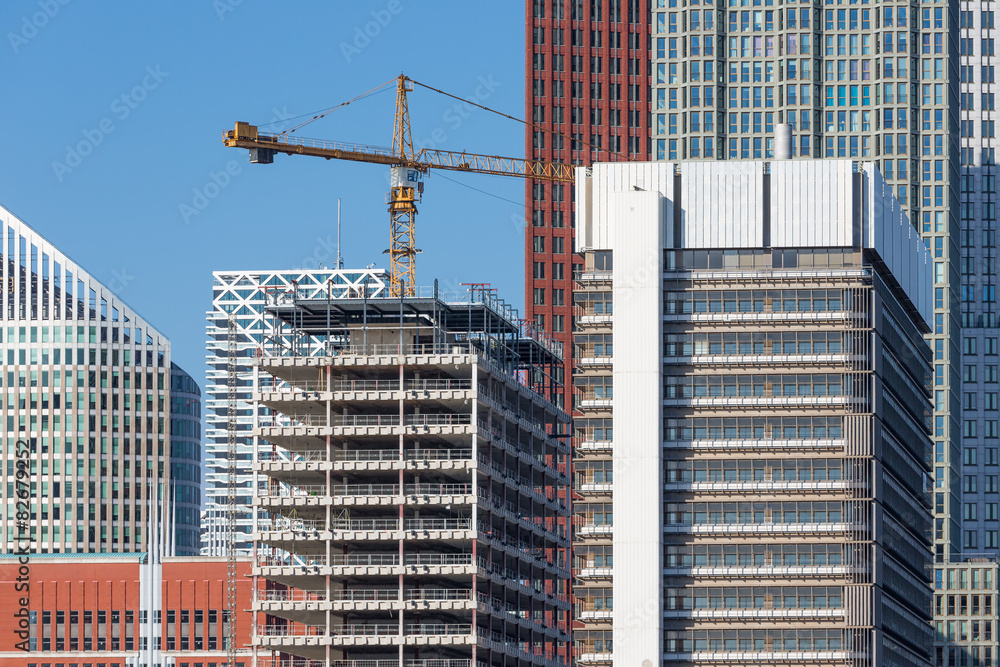 Skyscrapers with construction of a new office building Skyscrapers with construction of a new office building