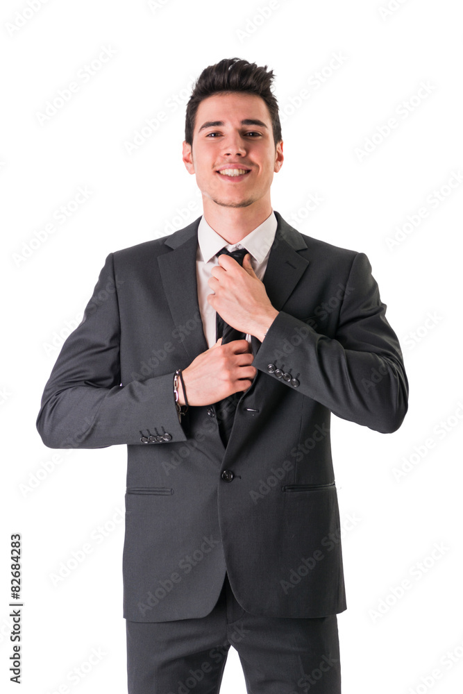 Young businessman confidently posing isolated on white Young businessman confidently posing isolated on white
