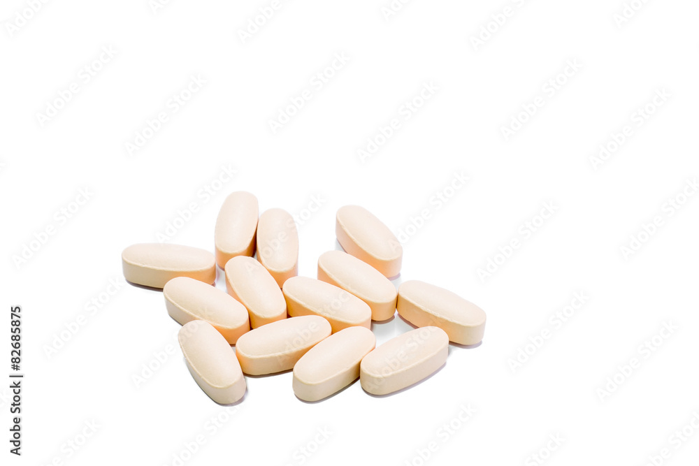 Heap of orange round medicine tablet pills Heap of orange round medicine tablet pills