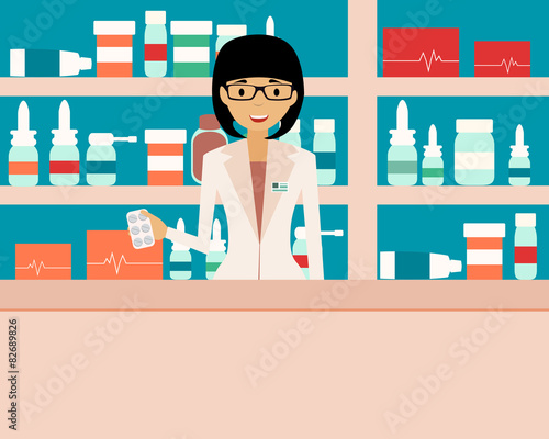 Happy female pharmacist standing in a  drugstore