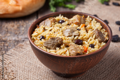 Bowl of hot traditional Arabic national rice food called pilaf