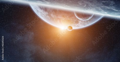 Fototapeta Naklejka Na Ścianę i Meble -  Sunrise over planets in space