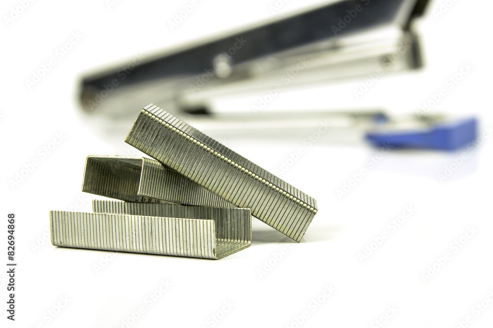Staples and Stapler on white background, isolated Staples and Stapler on white background, isolated