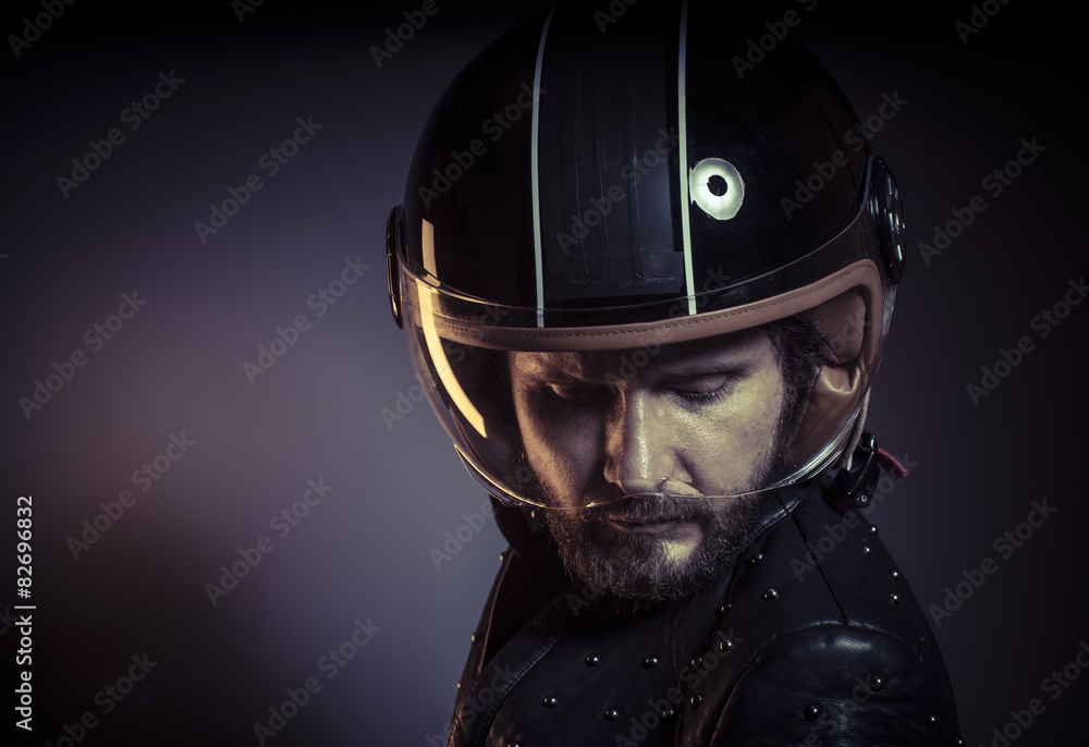 Danger, biker with motorcycle helmet and black leather jacket, m Danger, biker with motorcycle helmet and black leather jacket, m