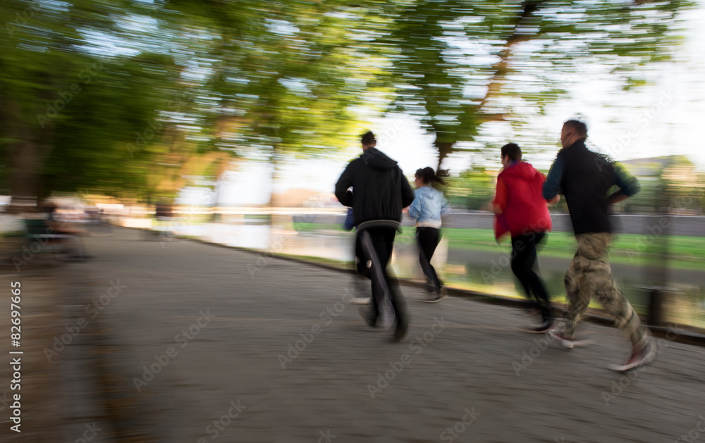 Group of runners on suburban street Group of runners on suburban street
