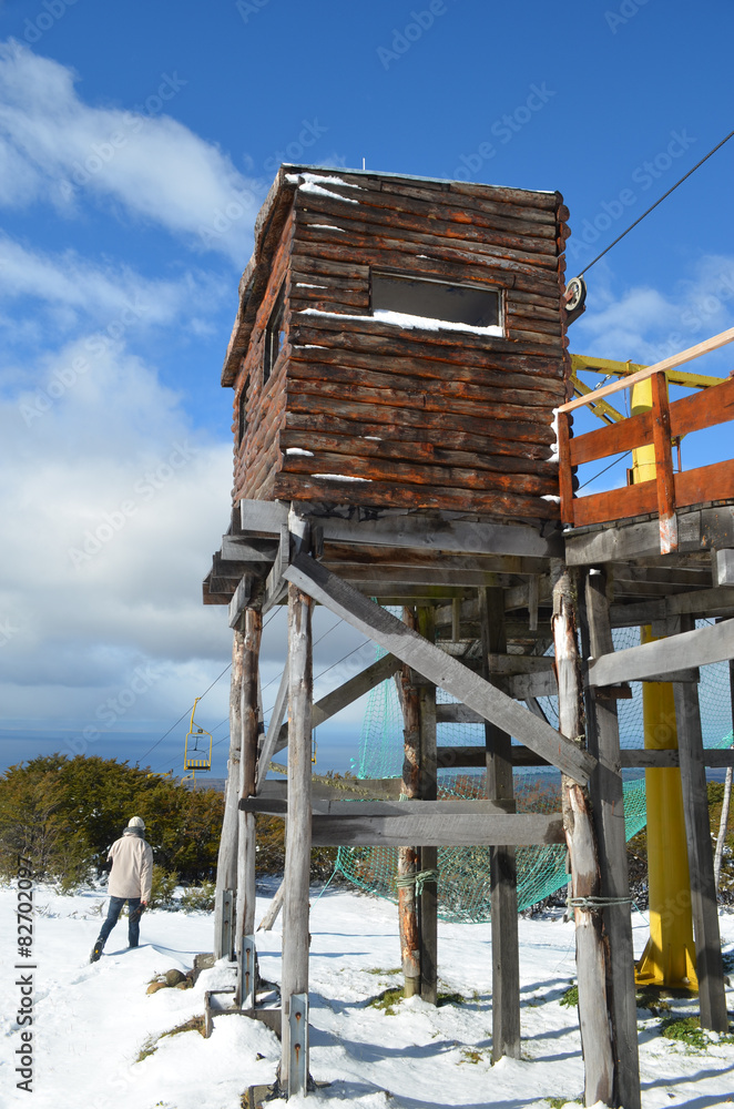 Wooden cabin of cable lift against blue sky, Punta Arenas