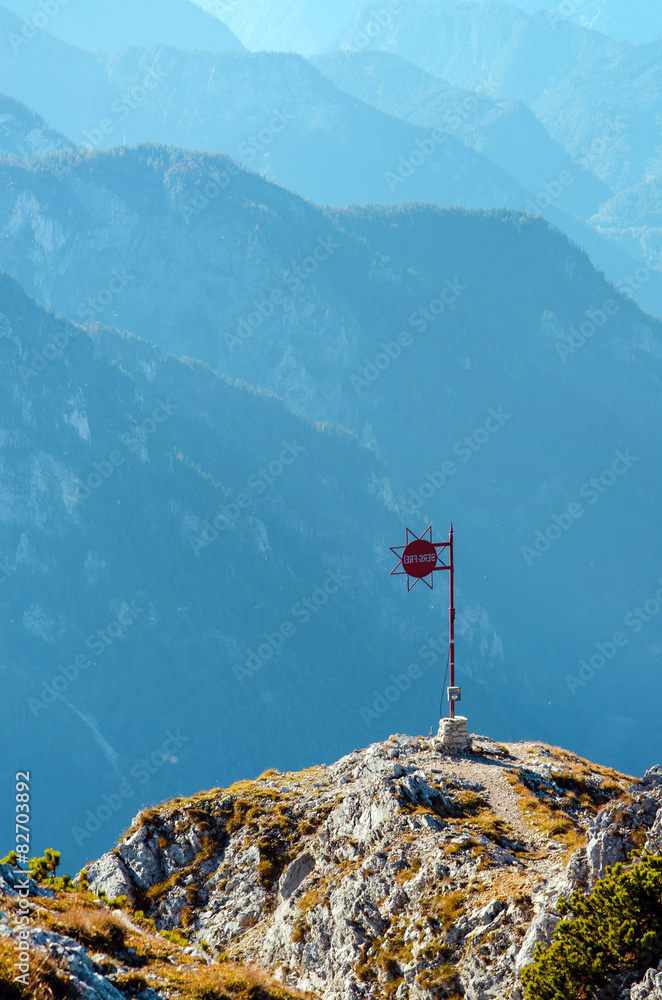 Metal mark at a mountain top in the alp.