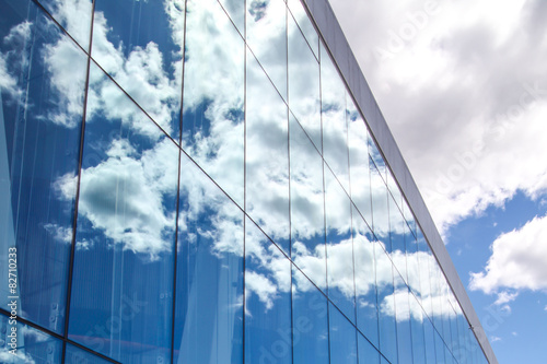Clouds reflected in the glass Opera House, Oslo, Norway