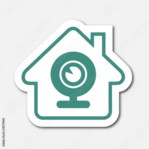 Logo maison et caméra.