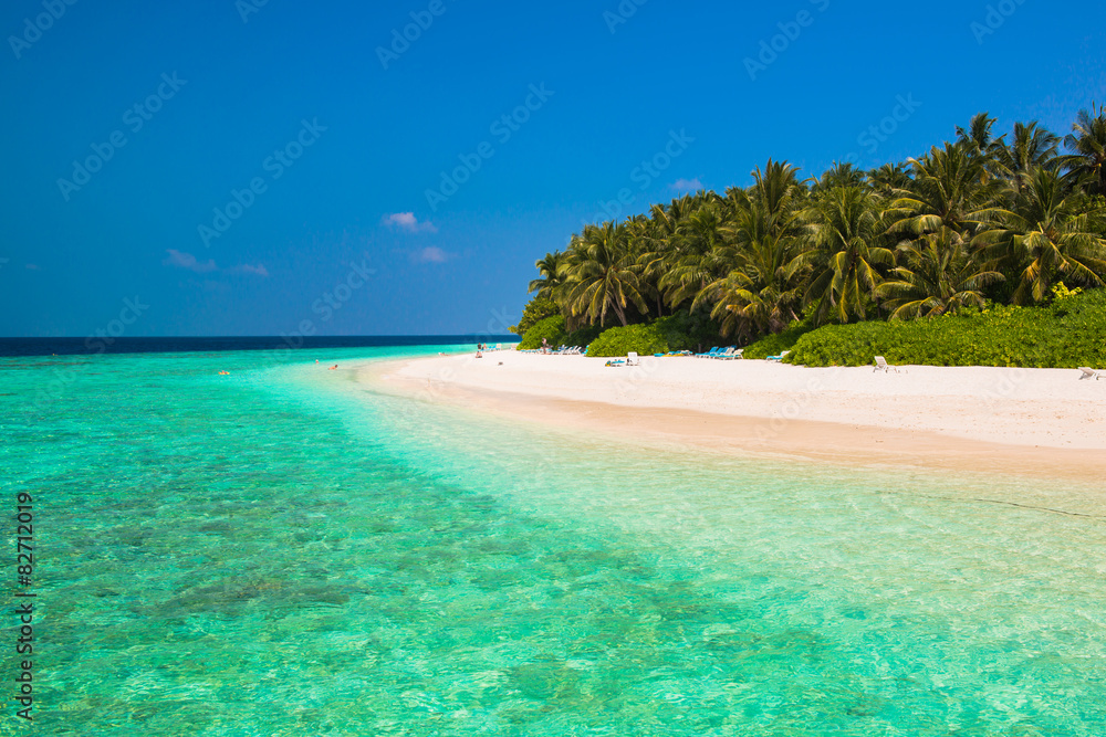 Sand beach and ocean wave, South Male Atoll. Maldives