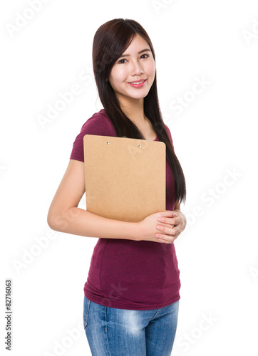 Young woman hold with clipboard