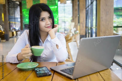 Businesswoman enjoy coffee at cafe