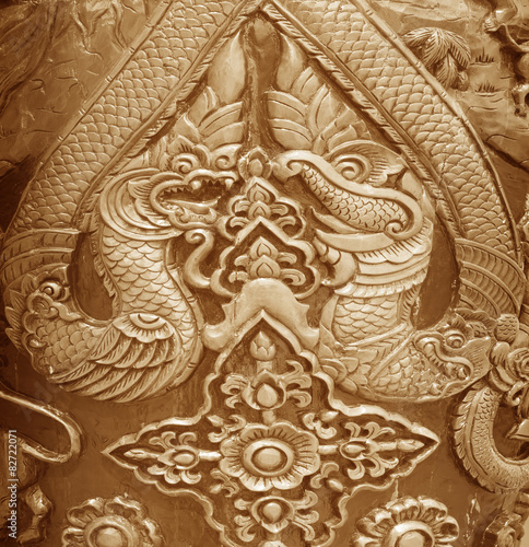 Antique Carved wood wall background.