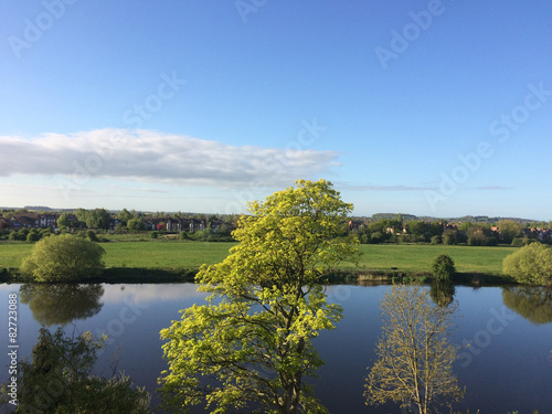 Early spring morning over the river Trent with mirroring effect