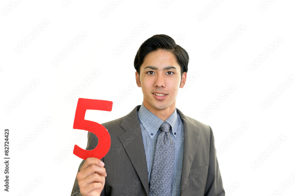 数字を持つビジネスマン