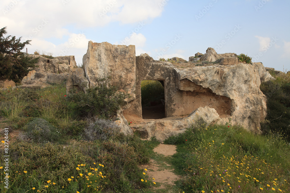 Overgrown with grass ruins to the Tombs of the Kings Paphos. Cyprus
