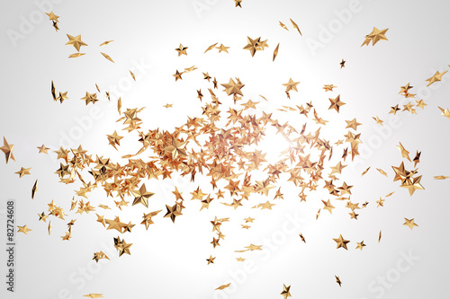 Abstract background with flying gold stars