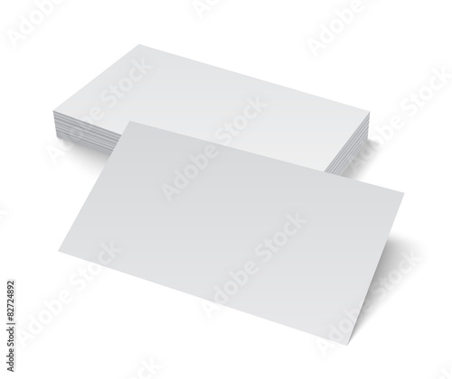 Stack of blank business card on white background with shadows.