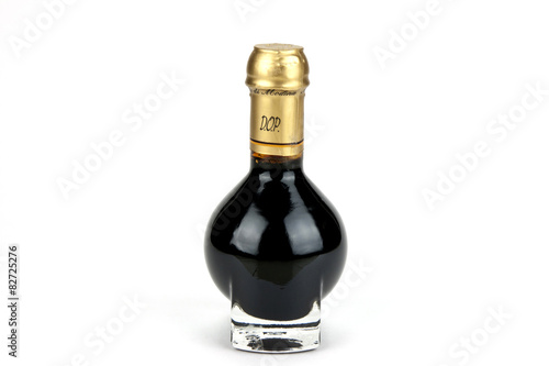 Traditional italian balsamic vinegar inside a special bottle iso