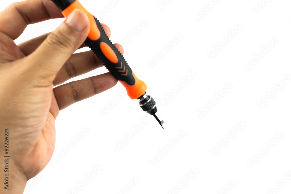 Naklejka premium hand holding screwdriver isolated