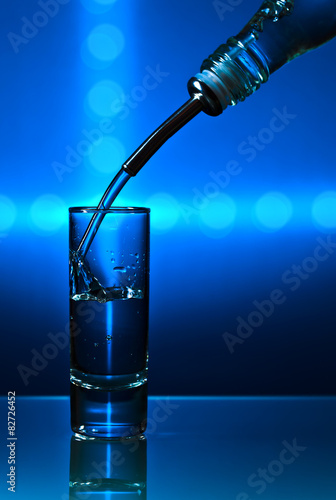vodka on blue background