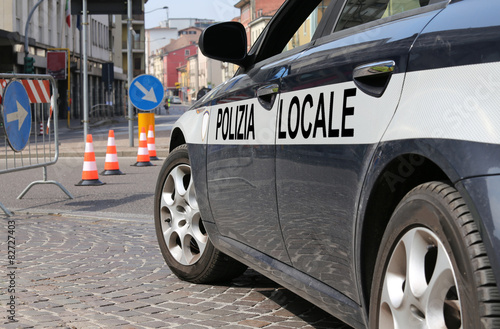 italian police car during the roadblock in the street
