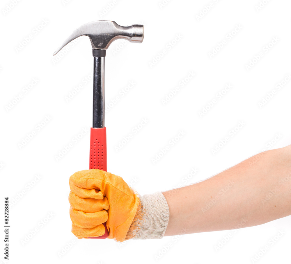 Man's hand in glove holding hammer. Man's hand in glove holding hammer.