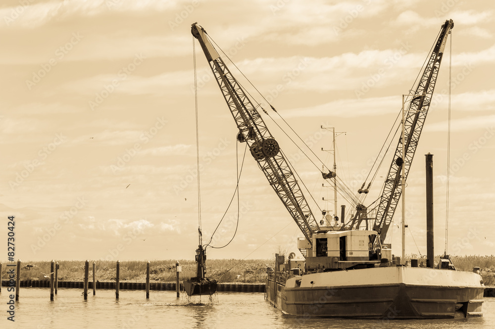 Fototapeta premium Effect vintage .Dredger ship navy