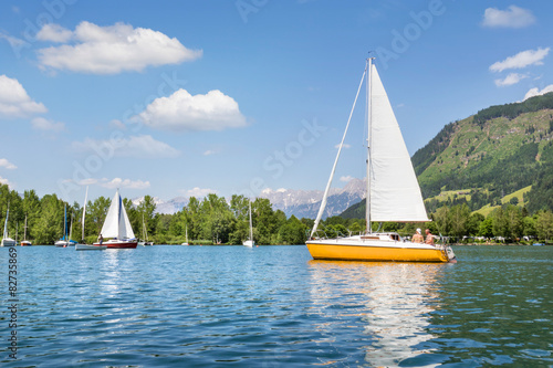 Yellow sailboat on the lake
