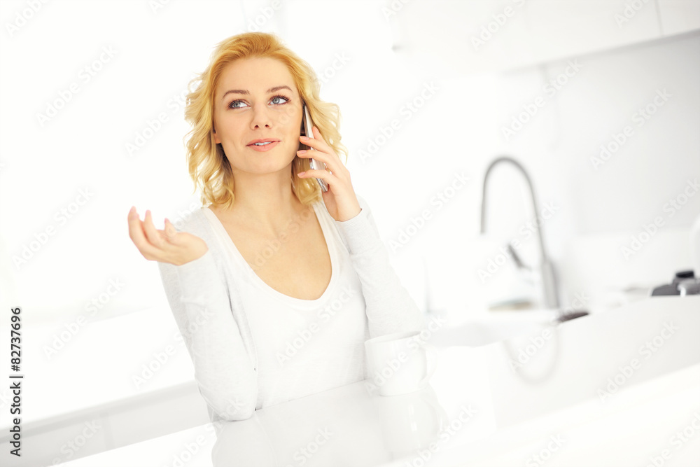 Woman talking on the smarphone Woman talking on the smarphone