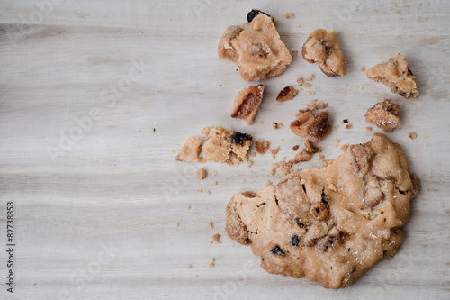 Chocolate cookies on wooden table with copyspace