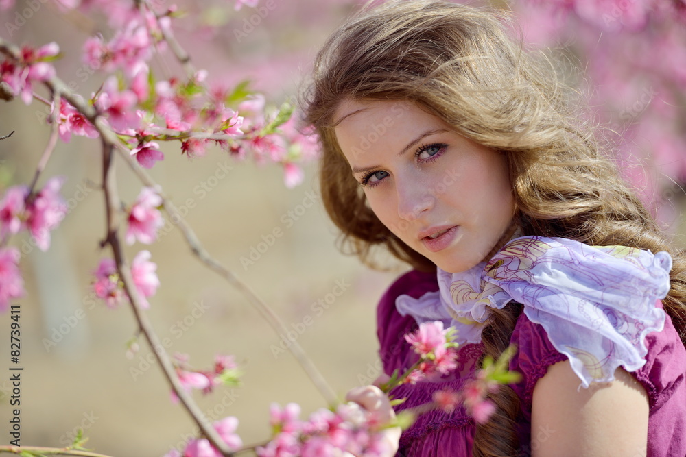 Fototapeta premium young woman portrait outdoor in spring
