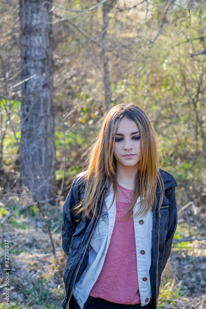 Outdoors portrait of beautiful young brunette girl Outdoors portrait of beautiful young brunette girl