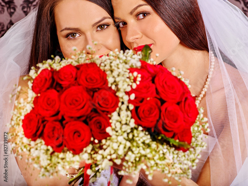 Wedding lesbians girl in bridal dress.