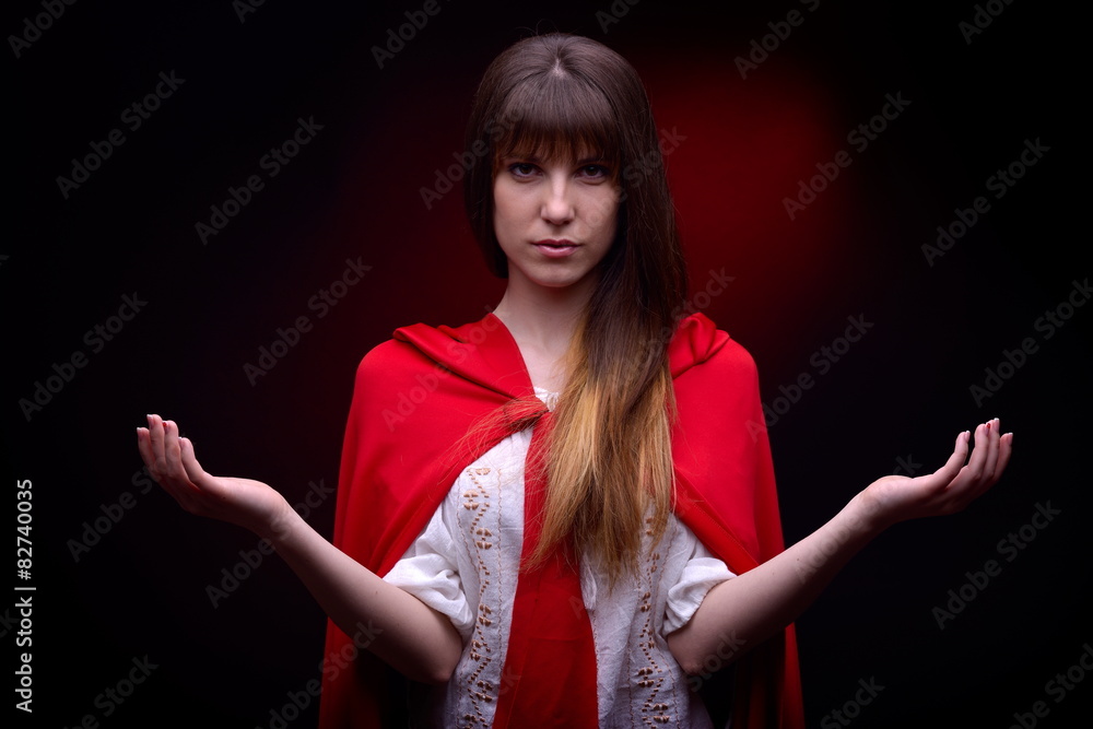 beautiful woman with red cloak in studio beautiful woman with red cloak in studio