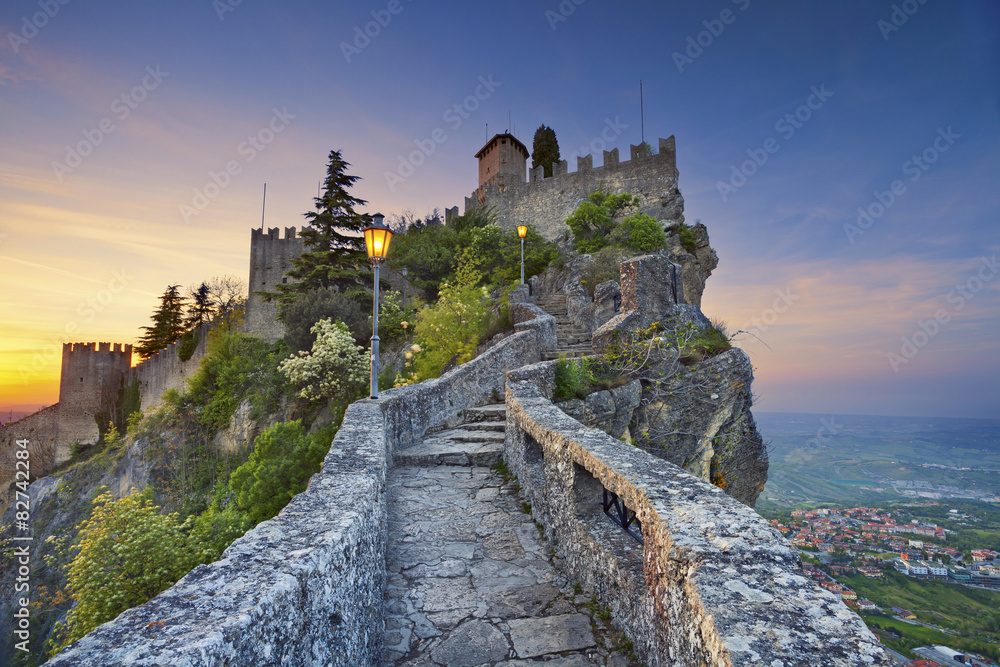 San Marino. Image of castle in San Marino during sunset.