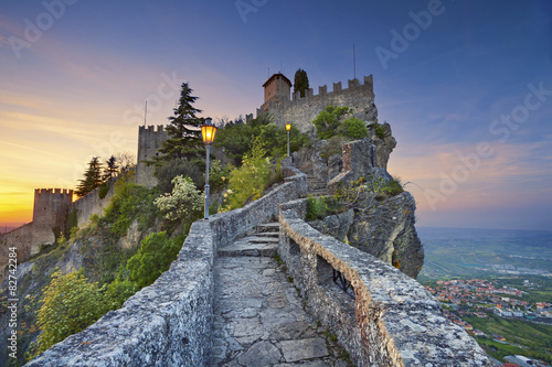 Obraz na płótnie San Marino. Image of castle in San Marino during sunset. w salonie