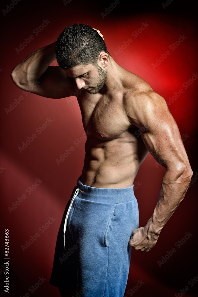 Fototapeta premium athletic young man portrait in studio