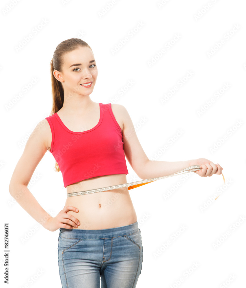 beautiful slender girl measures the waist isolated in white bac beautiful slender girl measures the waist isolated in white bac