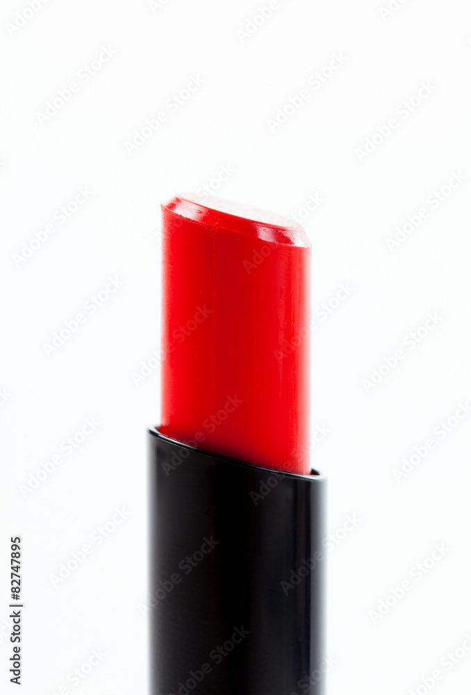 Obraz premium Red lipstick on white background