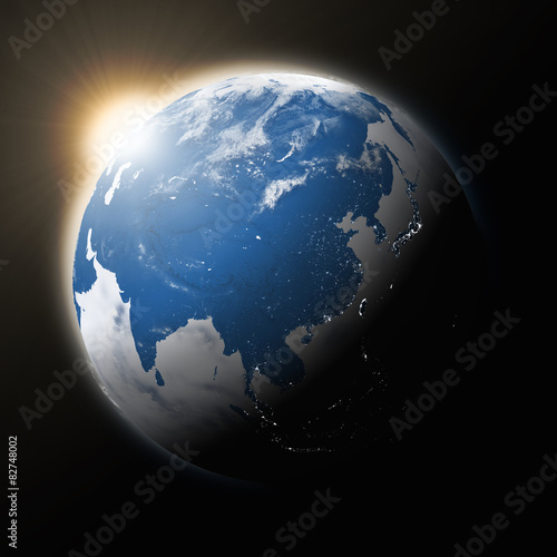 Fototapeta Naklejka Na Ścianę i Meble -  Sun over Southeast Asia on planet Earth