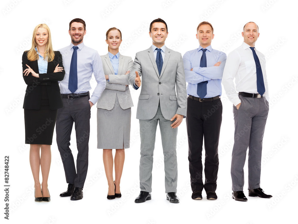 group of smiling businessmen making handshake group of smiling businessmen making handshake