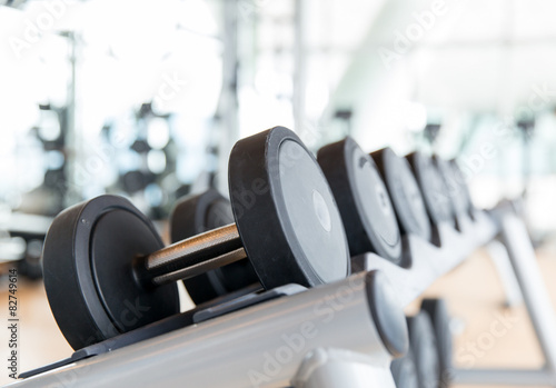 close up of dumbbells in gym